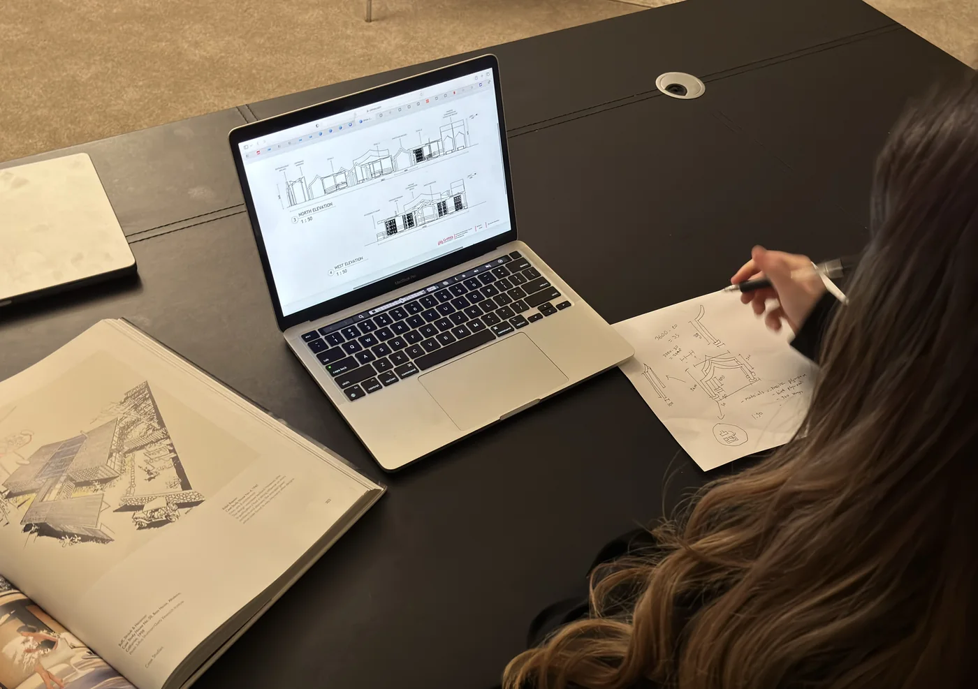 Sketching by hand alongside elevations drawn in Revit