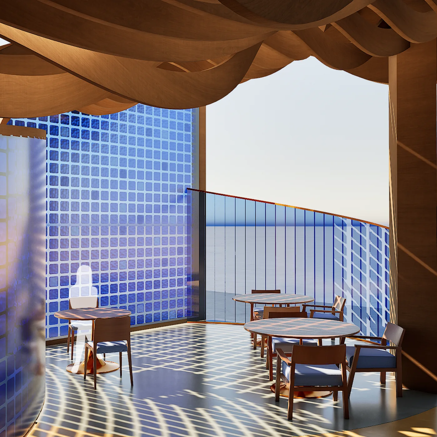 Terrace seating at The Mother of Pearl, looking past the glass block screen to the water